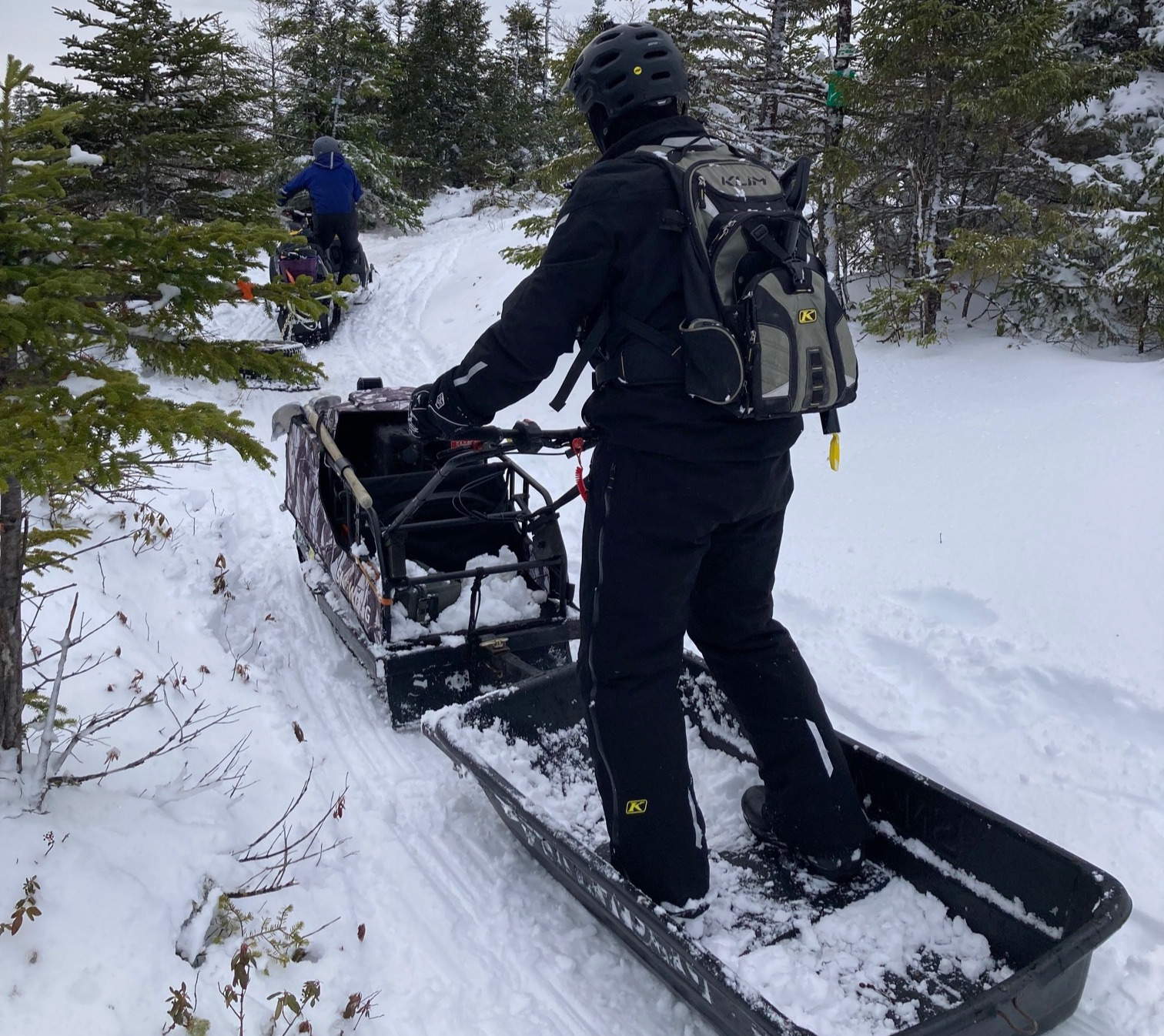 TPB Groomers volunteers grooming a snowy trail